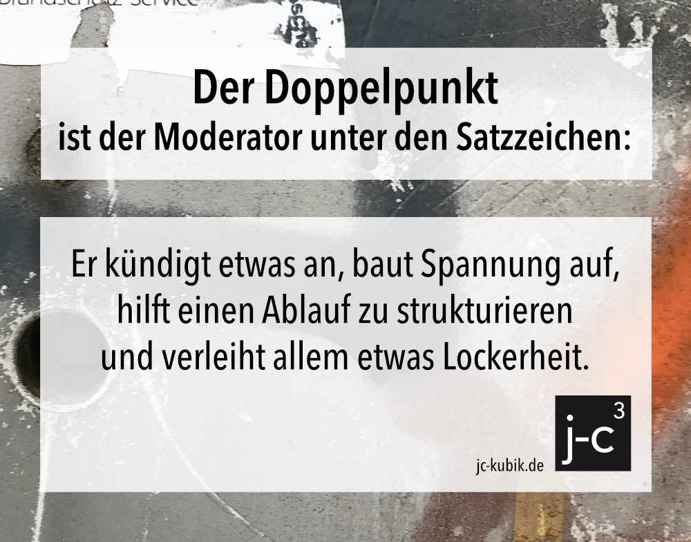 Titelbild Rubrik „Texterweisheiten“ für Beitrag „Doppelpunkt“ Bild zeigt eine Betonwand mit zwei Bohrungen.